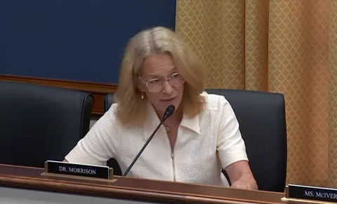 Representative Morrison speaks into microphone at Small Business Committee hearing