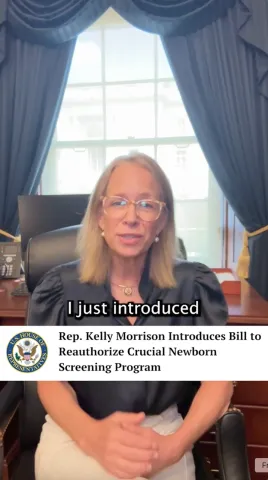 Kelly Morrison sitting in her office with caption